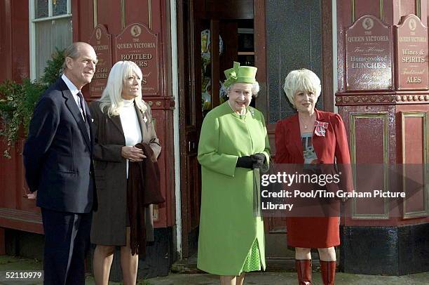 The Queen And Prince Philip Visiting The Set Of The " Eastenders " Television Show Meeting Barbara Windsor And Wendy Richards Outside The Queen Vic...