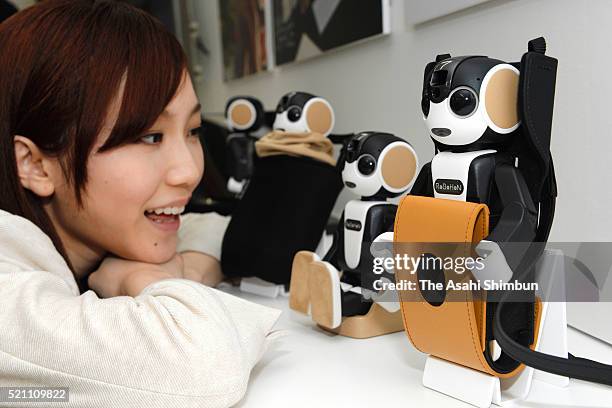 Model displays robot-shaped mobile phone 'RoBoHon' during a press conference on April 14, 2016 in Tokyo, Japan. Designed by robot creator Tomotaka...