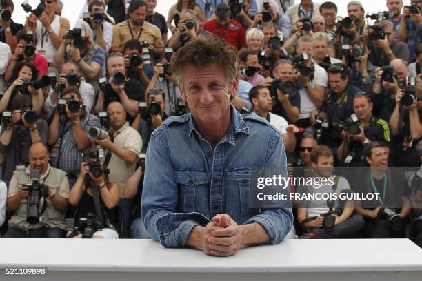 Actor Sean Penn poses during the photocall of "This Must Be The Place" presented in competition at the 64th Cannes Film Festival on May 20, 2011 in...