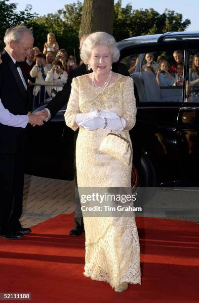 The Queen Attending A Banquet As Guest Of The States Of Guernsey Wearing A Dress Designed By Fashion Designer Sir Hardy Amies.