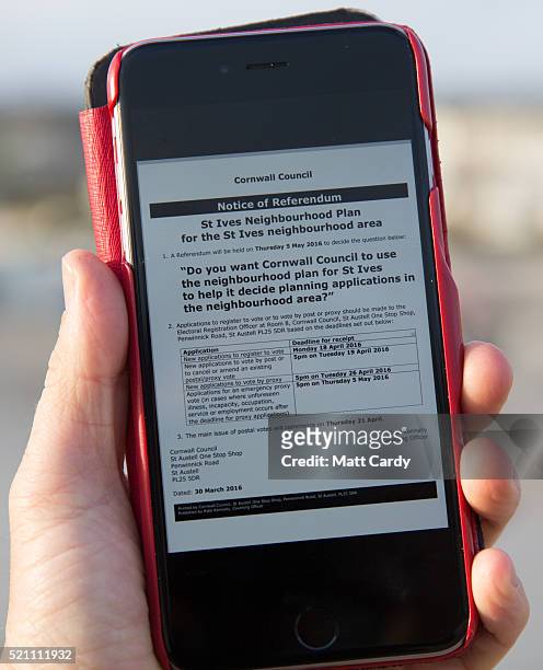 In this photo illustration an iPhone screen displays a online version of the referendum notice that has been issued to residents in the popular...