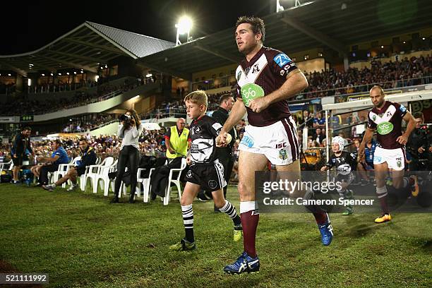 Jamie Lyon of the Sea Eagles leads team mates onto the field during the round seven NRL match between the Manly Sea Eagles and Parramatta Eels at...