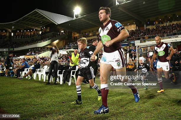 Jamie Lyon of the Sea Eagles leads team mates onto the field during the round seven NRL match between the Manly Sea Eagles and Parramatta Eels at...