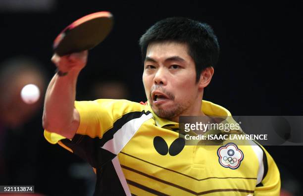 Chuang Chih-Yuan of Taiwan returns the ball during a men's singles semi final match against Fan Zhendong of China at the Asian Table Tennis...