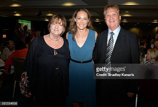 Samantha Stosur poses for a photo with her parents during the Fed Cup Official Dinner on April 14, 2016 in Brisbane, Australia.