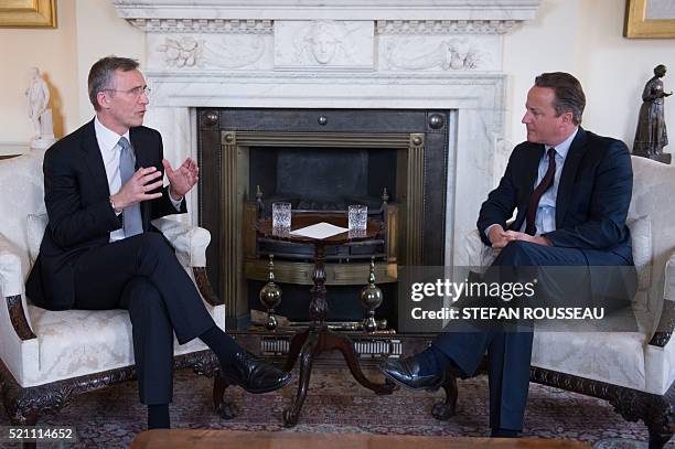 Britain's Prime Minister David Cameron and NATO Secretary General Jens Stoltenberg talk at the start of a meeting at 10 Downing Street in London on...