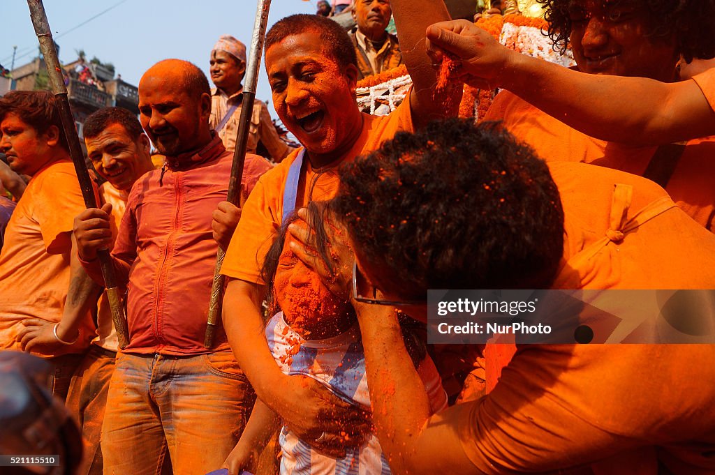 Vermilion Powder A devotee is smeared with vermillion powder while celebrating the ...