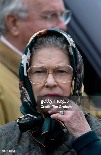 Queen Elizabeth Ll In Casual Clothes, Headscarf And Spectacles, Looking Anxious While Watching Her Husband Competing In The Cross Country Section Of...