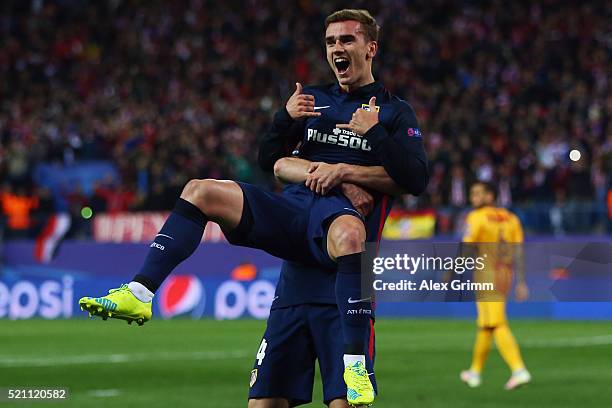 Antoine Griezmann of Atletico celebrates his team's first goal with team mate Gabi during the UEFA Champions league Quarter Final Second Leg match...