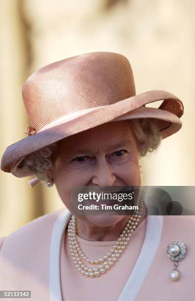 Queen Elizabeth Ll Smiling At The Start Of Her Golden Jubilee Tour In The South West Of England. The Queen Is Wearing An Apricot Suit And A Pale...