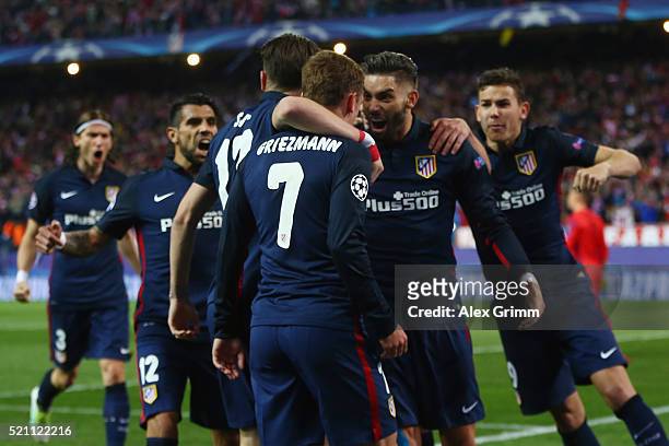 Antoine Griezmann of Atletico celebrates his team's first goal with team mates during the UEFA Champions league Quarter Final Second Leg match...