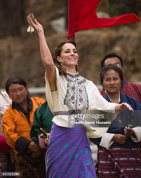 Catherine, Duchess of Cambridge takes part in dart throwing at Thimphu's open-air archery venue on April 14, 2016 in Thimphu, Bhutan.
