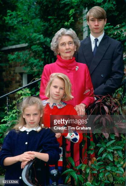 Princess Alice, Duchess Of Gloucester, With Her Grandchildren, The Earl Of Ulster, Lady Rose And Lady Davina Windsor At Kensington Palace During A...
