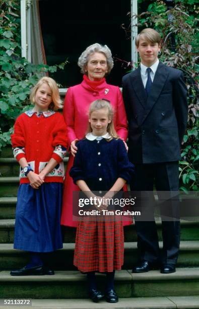 Princess Alice, Duchess Of Gloucester, With Her Grandchildren, The Earl Of Ulster, Lady Rose And Lady Davina Windsor At Kensington Palace During A...