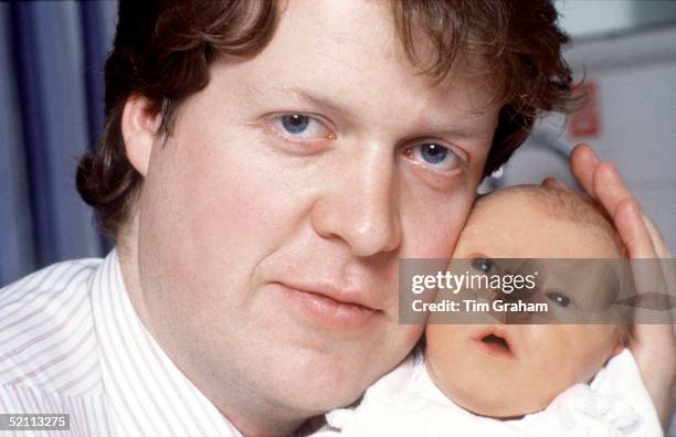 Viscount Althorp With His Baby Daughter , Kitty Eleanor Spencer, At St Mary's Hospital, Paddington, London.