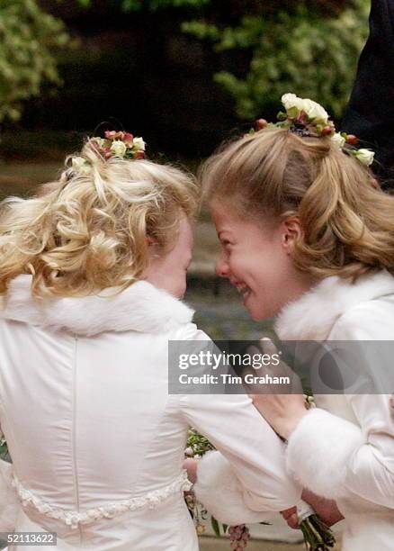 Two Of The Six Bridesmaids Giggling Together After The Wedding Of Lady Tamara Grosvenor And Edward Van Cutsem At Chester Cathedral.