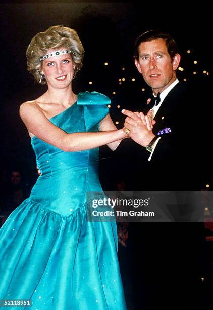 Prince Charles Dancing With His Wife, Princess Diana, In Melbourne, During Their Official Tour Of Australia. The Princess Is Wearing A Diamond And...