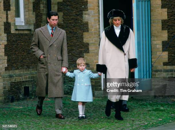 Prince Charles, Prince Harry And Princess Diana Holding Hands As They Arrive For A Photocall At Sandringham. She Is Wearing Cashmere And Wool Coat...