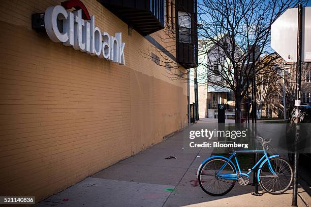 Bicycle is parked outside a Citigroup Inc. Citibank branch in Chicago, Illinois, U.S., on Monday, April 11, 2016. Citigroup Inc. Is scheduled to...