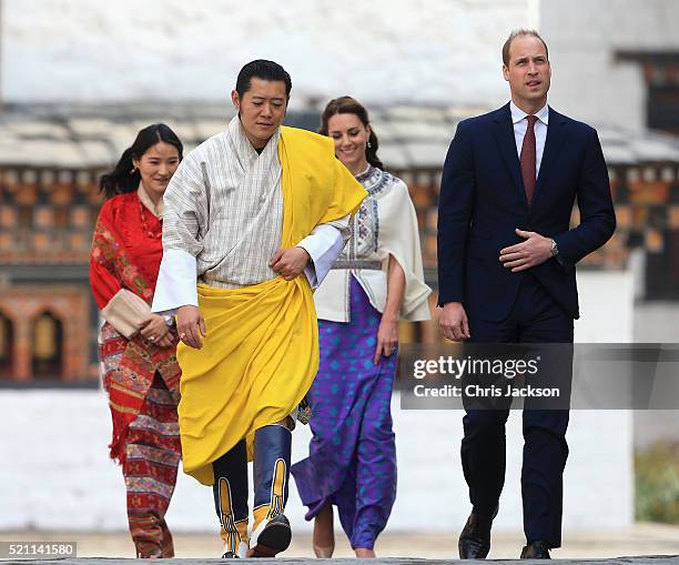 Prince William, Duke of Cambridge walks with His Majesty King Jigme Khesar Namgyel Wangchuck follwed by Catherine, Duchess of Cambridge and Her...