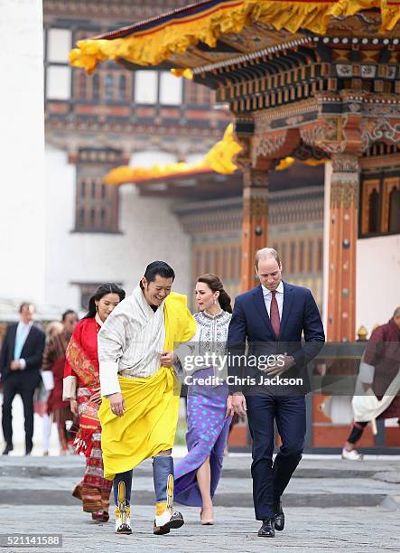 Prince William, Duke of Cambridge walks with His Majesty King Jigme Khesar Namgyel Wangchuck follwed by Catherine, Duchess of Cambridge and Her...