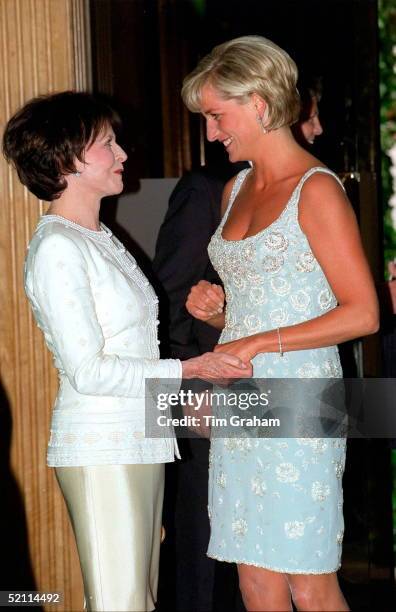 2d3lrincess Of Wales Shaking Hands With Her Friend Marguerite Littman, Founder Of The Aids Crisis Trust, At A Private Viewing And Reception At...