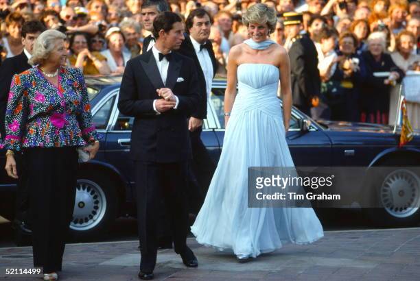 Prince Charles And Princess Diana Arriving At The Cannes Film Festival For A Gala Night In Honour Of Actor Sir Alec Guinness. The Princess Is Wearing...