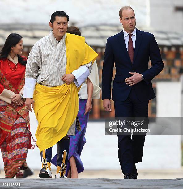 Prince William, Duke of Cambridge walks with His Majesty King Jigme Khesar Namgyel Wangchuck follwed by Catherine, Duchess of Cambridge and Her...