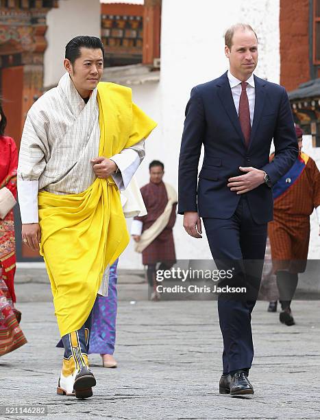 Prince William, Duke of Cambridge walks with His Majesty King Jigme Khesar Namgyel Wangchuck follwed by Catherine, Duchess of Cambridge and Her...