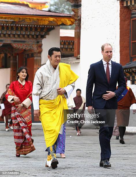 Prince William, Duke of Cambridge walks with His Majesty King Jigme Khesar Namgyel Wangchuck follwed by Catherine, Duchess of Cambridge and Her...