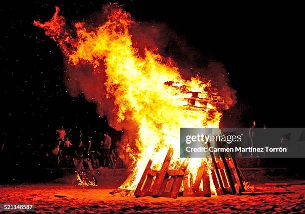 bonfire with people - bonfires in the night of san juan stock pictures, royalty-free photos & images