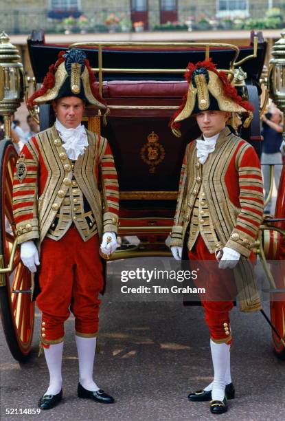 Footmen In State Livery At The Royal Mews, Buckingham Palace. This Uniform Is For State Occasions Such As Royal Weddings. Two Footmen Sit At The Back...