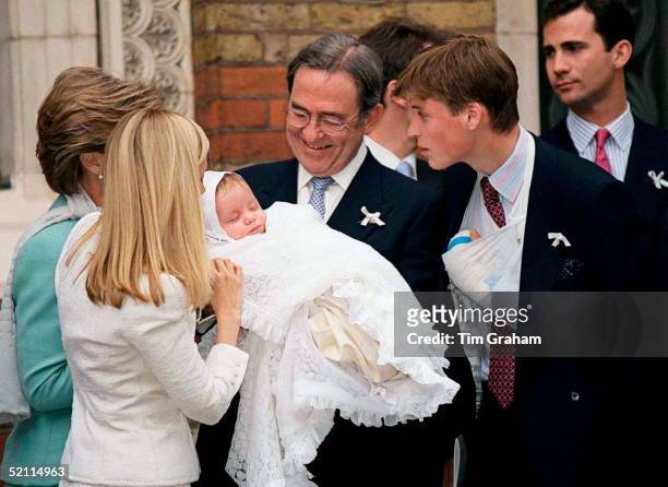 Prince William With His Godchild, Konstantine Alexios Of Greece Held By King Constantine Of Greece At The Greek Cathedral Of Saint Sophia In London....