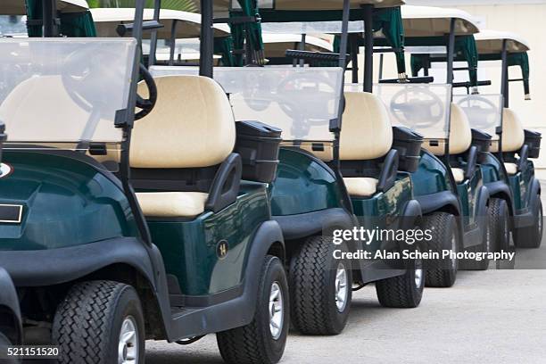 golf carts in a row - golf cart stock pictures, royalty-free photos & images