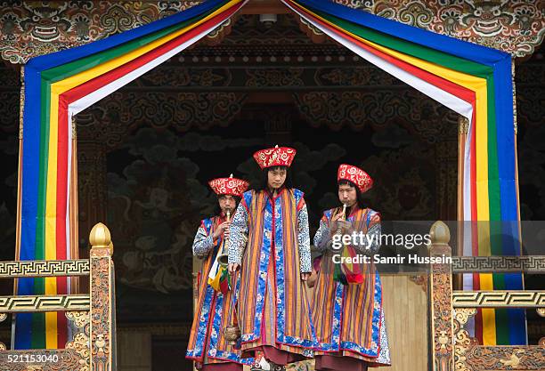 Musicians perform as Prince William, Duke of Cambridge and Catherine, Duchess of Cambridge attend a ceremonial welcome and audience at TashichhoDong...