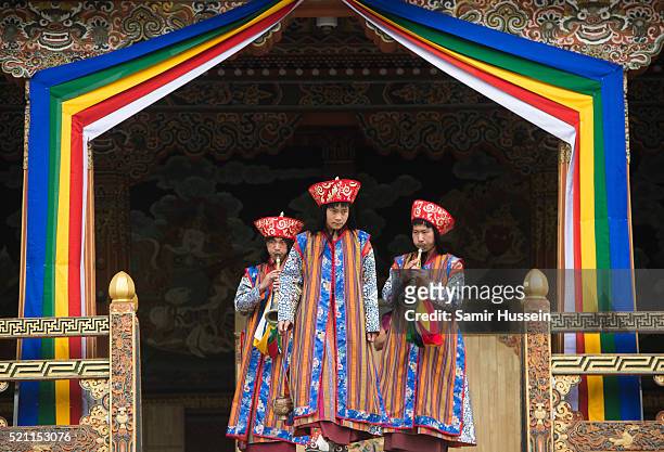 Musicians perform as Prince William, Duke of Cambridge and Catherine, Duchess of Cambridge attend a ceremonial welcome and audience at TashichhoDong...