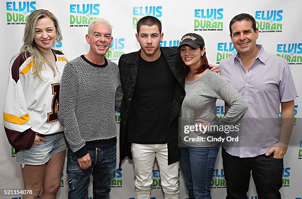 Nick Jonas poses for a photo with Bethany Watson, Elvis Duran, Danielle Monaro and Skeery Jone during a visit to "The Elvis Duran Z100 Morning Show"...