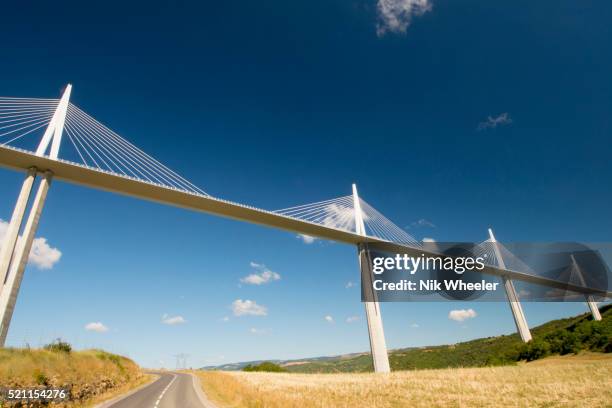 The Viaduc de Millau, Millau Viaduct, 909 foot high cable stayed road bridge over the River Tarn near Millau in Aveyron South of France is the...