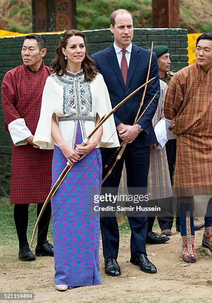 Catherine, Duchess of Cambridge and Prince William take part in archery at Thimphu's open-air archery venue on April 14, 2016 in Thimphu, Bhutan.