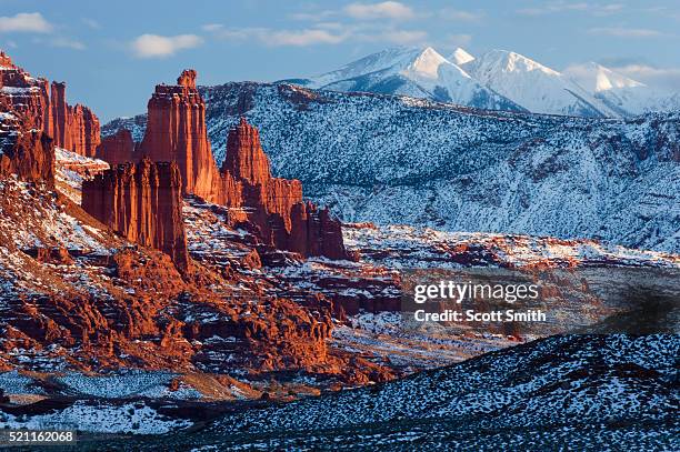 utah. usa. fisher towers and la sal mountains in winter. - canyon utah stock pictures, royalty-free photos & images