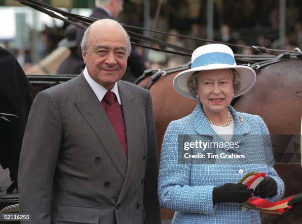 The Queen With Mohammed Al Fayed, Owner Of Harrods - The Sponsors Of The Royal Windsor Horse Show