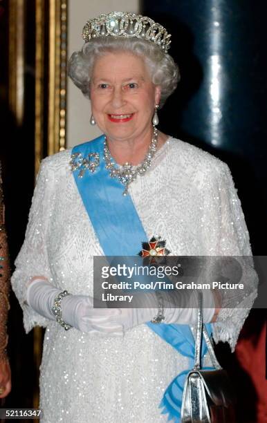 Queen Elizabeth II Wearing Decorations And Orders With Diamonds And Pearls At Buckingham Palace For A State Banquet