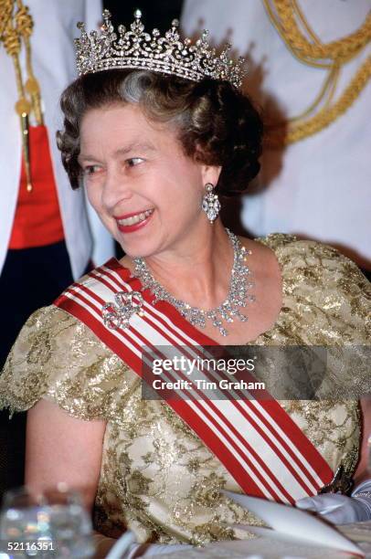 Queen Elizabeth II At State Banquet. Her Diamond Tiara Was Made By Garrard Is Referred To As 'granny's Tiara' As It Was Originally A Wedding Gift To...