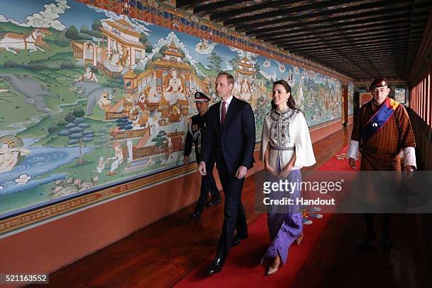 In this handout photo provided by Bhutan Royal Office, Prince William, Duke of Cambridge and Catherine, Duchess of Cambridge arrive at a ceremonial...