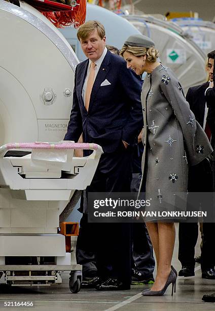 Dutch Queen Maxima and King Willem-Alexander visit the Siemens Healthcare complex in Erlangen, on April 14 as part of a two-day visit of the Dutch...