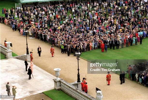 The Queen And Prince Philip Prepare To Greet Guests At A Buckingham Palace Garden Party