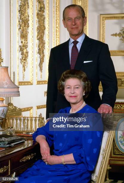 Queen Elizabeth II With Prince Philip In Their Drawing Room At Home In Windsor Castle Posing For A Photographic Session For Tim Graham. The...