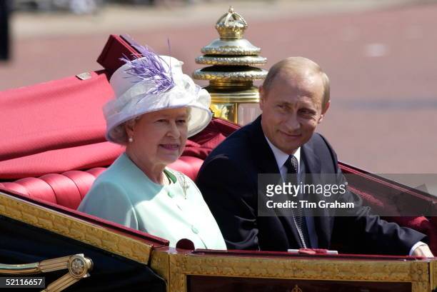 As Part Of The First State Visit By A Russian Leader Since 1874 President Putin Of The Russian Federation Rides With Queen Elizabeth Ll In An Open...
