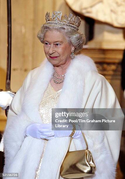 Queen Elizabeth Ll Smiling As She Arrives At The Palace Of Westminster For The State Opening Of Parliament. The Queen Is Wearing A Diamond Crown...