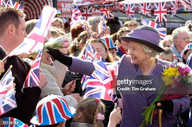 Queen Elizabeth Ll Pays Tribute To Couturier Hardy Amies, Who Died Yesterday, By Wearing One Of His Outfits. As She Walks Through Romford Market,...